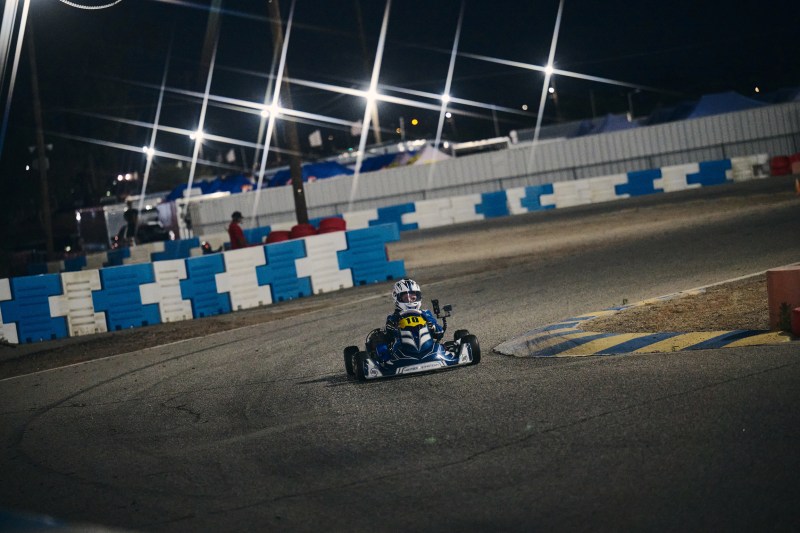 Reid Eck kart number 10 racing at Apex under the lights